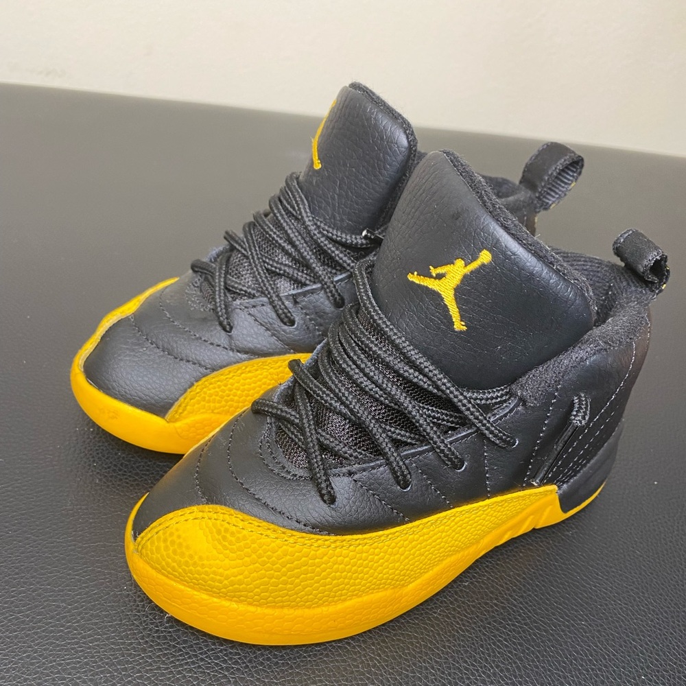 Black university gold Jordan 12 size 10 toddler